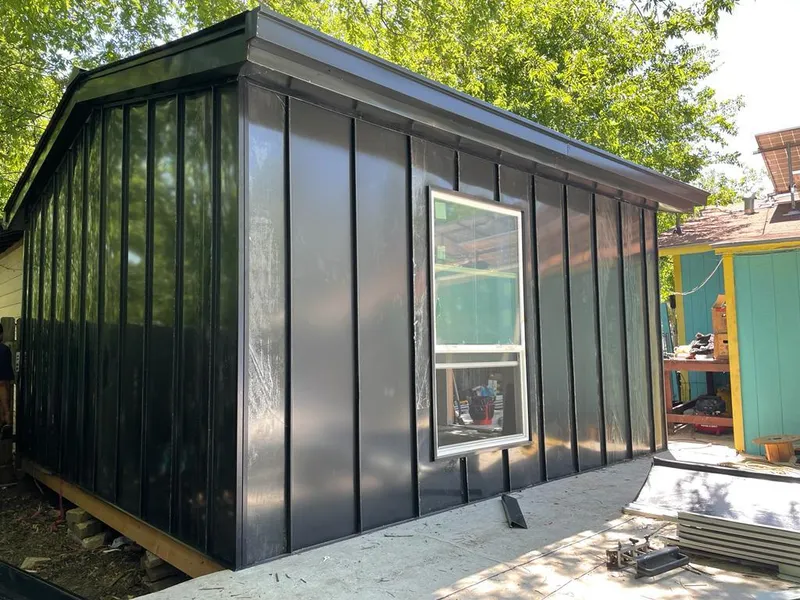 Black standing seam metal wall panels for Metal Roof Installation in Norton