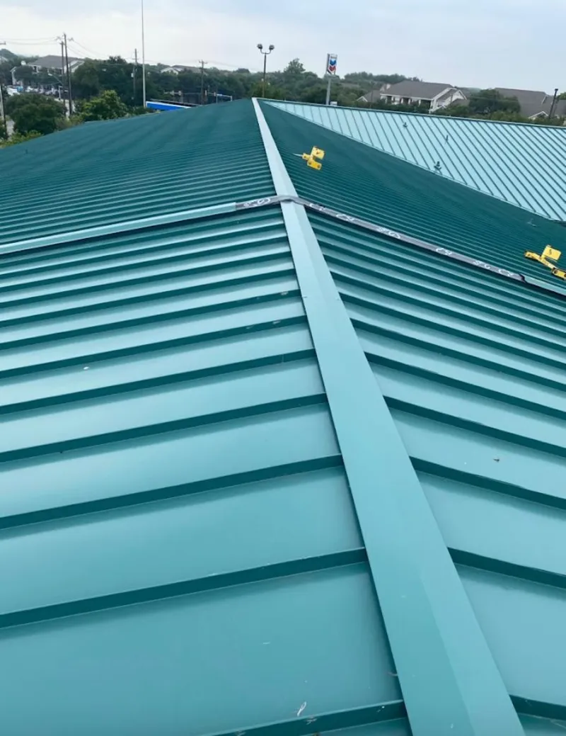 Green commercial metal roof ridge and valley for Metal Roof Repair in Norton